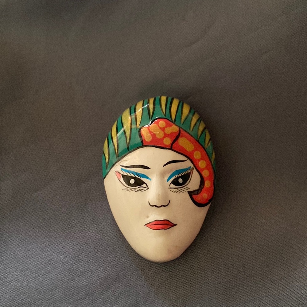 Handmade wooden brooch facial